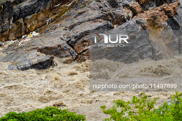 Bagmati River floods and affects riverbanks during heavy rainfall in Kathmandu, Nepal, on August 21, 2024 