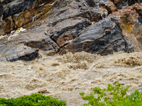 Bagmati River floods and affects riverbanks during heavy rainfall in Kathmandu, Nepal, on August 21, 2024 (