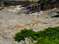 Bagmati River floods and affects riverbanks during heavy rainfall in Kathmandu, Nepal, on August 21, 2024 (