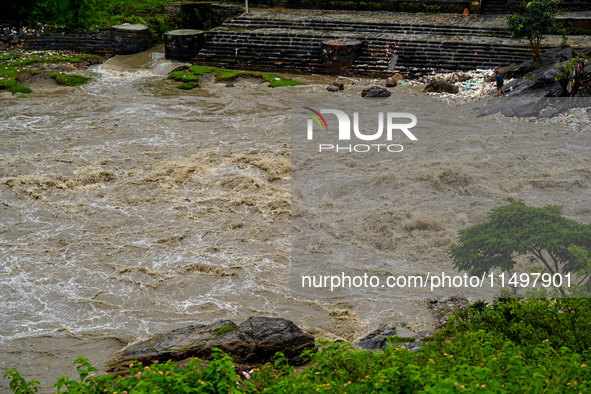 Bagmati River floods and affects riverbanks during heavy rainfall in Kathmandu, Nepal, on August 21, 2024 