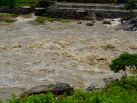 Bagmati River floods and affects riverbanks during heavy rainfall in Kathmandu, Nepal, on August 21, 2024 (