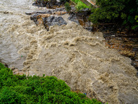 Bagmati River floods and affects riverbanks during heavy rainfall in Kathmandu, Nepal, on August 21, 2024 (