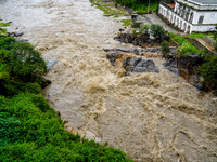 Bagmati River floods and affects riverbanks during heavy rainfall in Kathmandu, Nepal, on August 21, 2024 (