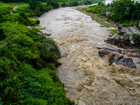 Bagmati River floods and affects riverbanks during heavy rainfall in Kathmandu, Nepal, on August 21, 2024 (