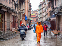 People's daily lives are affected by the heavy rainfall in Kathmandu, Nepal, on August 21, 2024. (