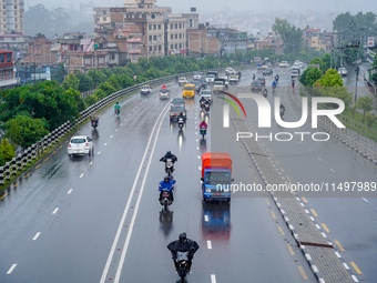 People's daily lives are affected by the heavy rainfall in Kathmandu, Nepal, on August 21, 2024. (