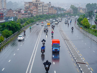 People's daily lives are affected by the heavy rainfall in Kathmandu, Nepal, on August 21, 2024. (