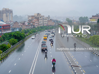 People's daily lives are affected by the heavy rainfall in Kathmandu, Nepal, on August 21, 2024. (