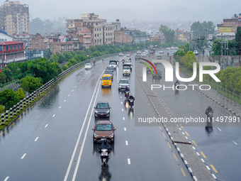 People's daily lives are affected by the heavy rainfall in Kathmandu, Nepal, on August 21, 2024. (