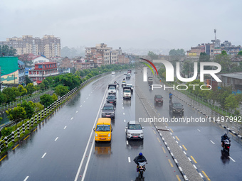 People's daily lives are affected by the heavy rainfall in Kathmandu, Nepal, on August 21, 2024. (