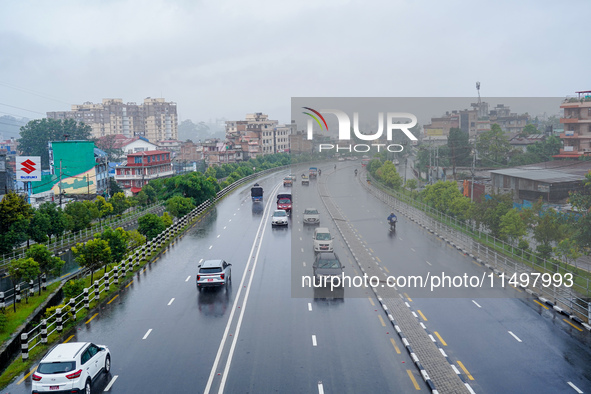 People's daily lives are affected by the heavy rainfall in Kathmandu, Nepal, on August 21, 2024. 