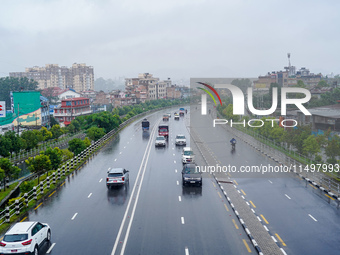 People's daily lives are affected by the heavy rainfall in Kathmandu, Nepal, on August 21, 2024. (