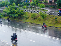 People's daily lives are affected by the heavy rainfall in Kathmandu, Nepal, on August 21, 2024. (