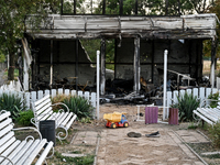 A toy truck is seen outside the Levada children's cafe in the central park damaged by a Russian artillery shell strike in Malokaterynivka vi...