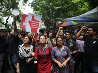 Medical students and doctors attend a protest rally against the rape and murder of a PGT woman doctor at Government-run R G Kar Medical Coll...