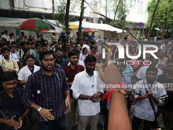 Medical students and doctors attend a protest rally against the rape and murder of a PGT woman doctor at Government-run R G Kar Medical Coll...