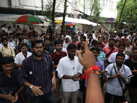 Medical students and doctors attend a protest rally against the rape and murder of a PGT woman doctor at Government-run R G Kar Medical Coll...