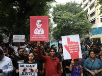 Medical students and doctors attend a protest rally against the rape and murder of a PGT woman doctor at Government-run R G Kar Medical Coll...