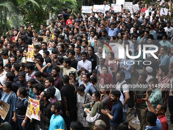 Medical students and doctors attend a protest rally against the rape and murder of a PGT woman doctor at Government-run R G Kar Medical Coll...