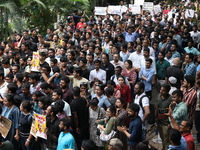 Medical students and doctors attend a protest rally against the rape and murder of a PGT woman doctor at Government-run R G Kar Medical Coll...