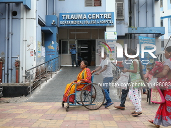 A patient waits for treatment at Government-run R G Kar Medical College & Hospital in Kolkata, India, on August 21, 2024. (