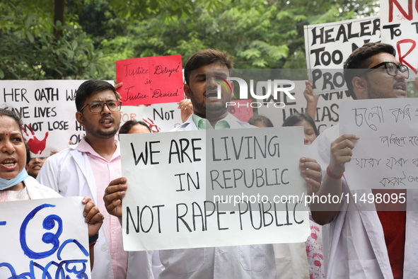 Medical students and doctors attend a protest rally against the rape and murder of a PGT woman doctor at Government-run R G Kar Medical Coll...