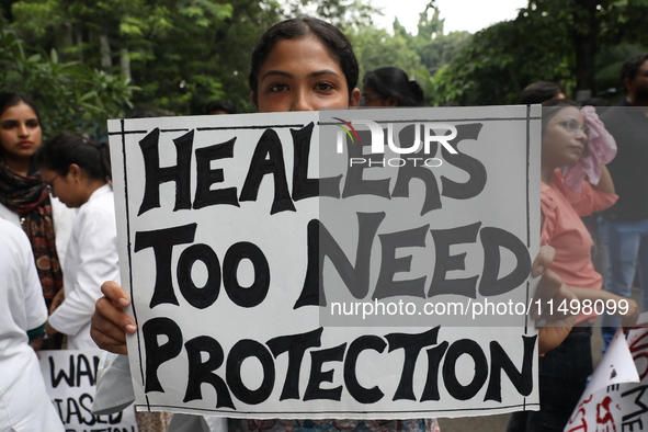 Medical students and doctors attend a protest rally against the rape and murder of a PGT woman doctor at Government-run R G Kar Medical Coll...