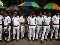 The police force deploys while medical students and doctors attend a protest rally against the rape and murder of a PGT woman doctor at Gove...