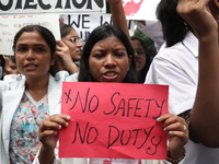 Medical students and doctors attend a protest rally against the rape and murder of a PGT woman doctor at Government-run R G Kar Medical Coll...