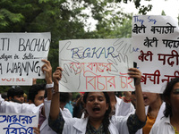 Medical students and doctors attend a protest rally against the rape and murder of a PGT woman doctor at Government-run R G Kar Medical Coll...