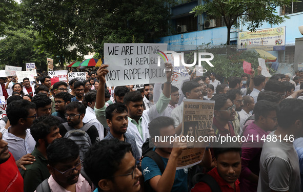 Medical students and doctors attend a protest rally against the rape and murder of a PGT woman doctor at Government-run R G Kar Medical Coll...