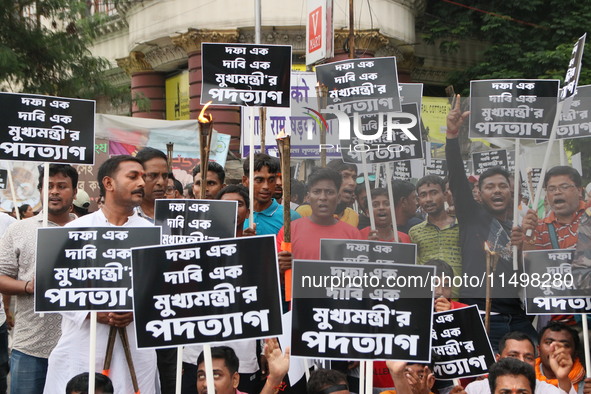 Writers, actors, artists, and film directors participate in a protest rally against the rape and murder of a PGT woman doctor at Government-...