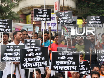 Writers, actors, artists, and film directors participate in a protest rally against the rape and murder of a PGT woman doctor at Government-...