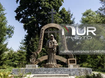 The monument to the victims of communist repressions and the Holodomor in the almost deserted town of Bilopillia in the Sumy region near the...