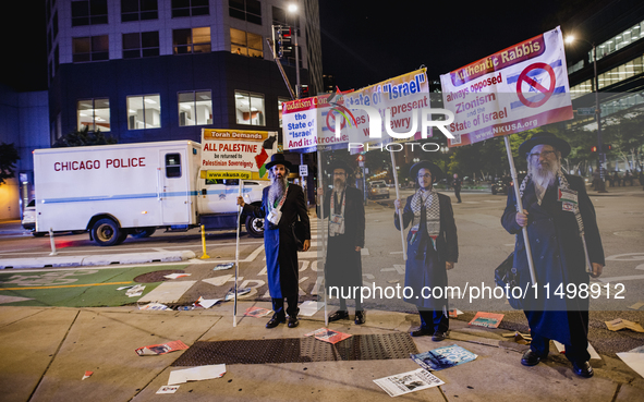 Pro-Palestine protesters hold a ''Make it Great Like '68'' protest in front of the Israeli consulate in Chicago, United States, on August 20...