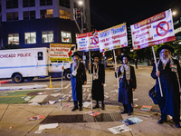 Pro-Palestine protesters hold a ''Make it Great Like '68'' protest in front of the Israeli consulate in Chicago, United States, on August 20...