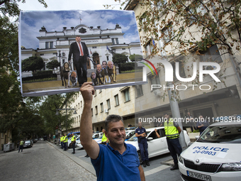 Protesters march and blockade the key intersection Eagle's Bridge in Sofia, Bulgaria, on August 21, 2024, demanding the resignation of caret...