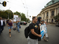 Protesters march and blockade the key intersection Eagle's Bridge in Sofia, Bulgaria, on August 21, 2024, demanding the resignation of caret...