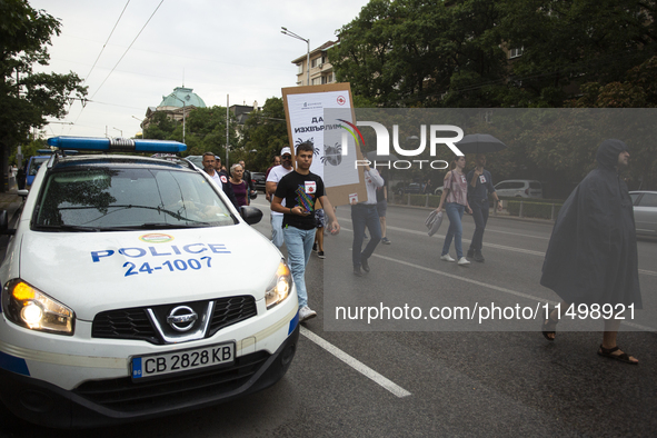 Protesters march and blockade the key intersection Eagle's Bridge in Sofia, Bulgaria, on August 21, 2024, demanding the resignation of caret...