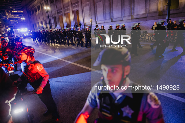 Pro-Palestine protesters hold a ''Make it Great Like '68'' protest in front of the Israeli consulate in Chicago, United States, on August 20...