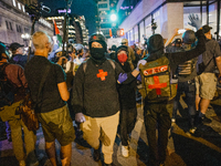 Pro-Palestine protesters hold a ''Make it Great Like '68'' protest in front of the Israeli consulate in Chicago, United States, on August 20...