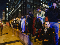 Pro-Palestine protesters hold a ''Make it Great Like '68'' protest in front of the Israeli consulate in Chicago, United States, on August 20...