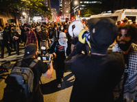 Pro-Palestine protesters hold a ''Make it Great Like '68'' protest in front of the Israeli consulate in Chicago, United States, on August 20...