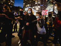 Pro-Palestine protesters hold a ''Make it Great Like '68'' protest in front of the Israeli consulate in Chicago, United States, on August 20...