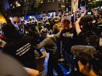 Pro-Palestine protesters hold a ''Make it Great Like '68'' protest in front of the Israeli consulate in Chicago, United States, on August 20...