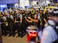 Pro-Palestine protesters hold a ''Make it Great Like '68'' protest in front of the Israeli consulate in Chicago, United States, on August 20...