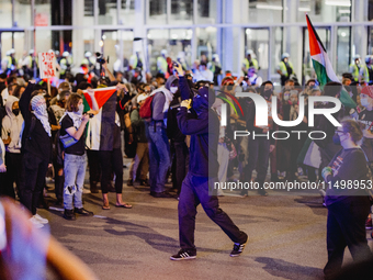 Pro-Palestine protesters hold a ''Make it Great Like '68'' protest in front of the Israeli consulate in Chicago, United States, on August 20...