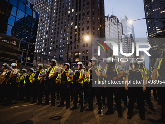 Pro-Palestine protesters hold a ''Make it Great Like '68'' protest in front of the Israeli consulate in Chicago, United States, on August 20...