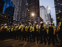 Pro-Palestine protesters hold a ''Make it Great Like '68'' protest in front of the Israeli consulate in Chicago, United States, on August 20...