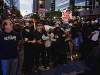 Pro-Palestine protesters hold a ''Make it Great Like '68'' protest in front of the Israeli consulate in Chicago, United States, on August 20...